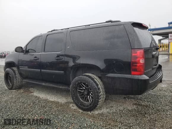 2007 Chevrolet Suburban LTZ z VIN 3GNFK163X7G269745, wystawiony jako Copart lot #81144565 z przebiegiem 328 322 mil mil oraz Szkoda całkowita • Salvage title. Historia ofert i sprzedaży dostępna na DreamBid. Obrazek 2.