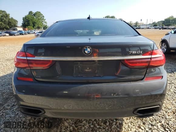 2016 BMW 7 Series 750i с VIN WBA7F0C57GGM20857, выставлен на аукционе Copart как лот 61143845 с пробегом 141 313 миль миль и Списание • Salvage title. История ставок и продаж доступна на DreamBid. Изображение 6.