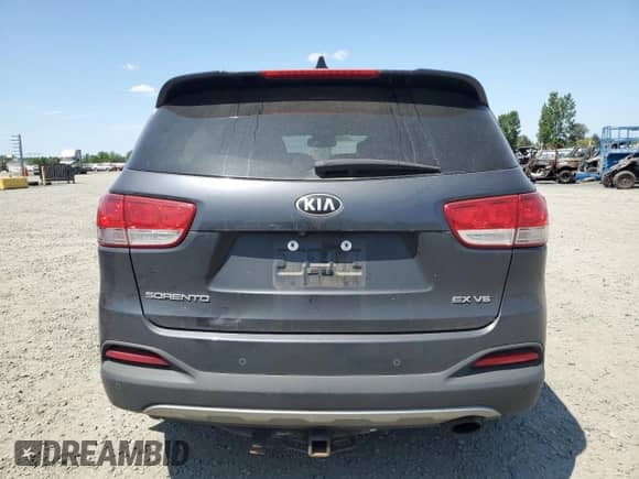 2018 Kia Sorento EX with VIN 5XYPHDA55JG395801, listed as a Copart auction lot 60622665 with 83,100 mi miles and Salvage title. Bid and sale history available at DreamBid. Image 6.