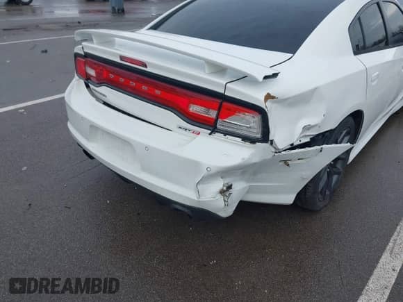 2013 Dodge Charger SRT-8 z VIN 2C3CDXEJXDH675646, wystawiony jako IAAI lot #41464139 z przebiegiem 105 583 mil mil oraz . Historia ofert i sprzedaży dostępna na DreamBid. Obrazek 6.