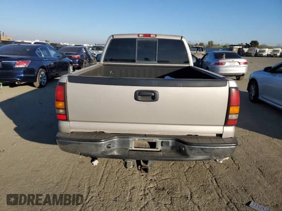 2005 GMC Sierra 1500 SLE with VIN 1GTEC14T65Z276824, listed as a Copart auction lot 42176605 with 248,047 mi miles and Salvage title. Bid and sale history available at DreamBid. Image 6.