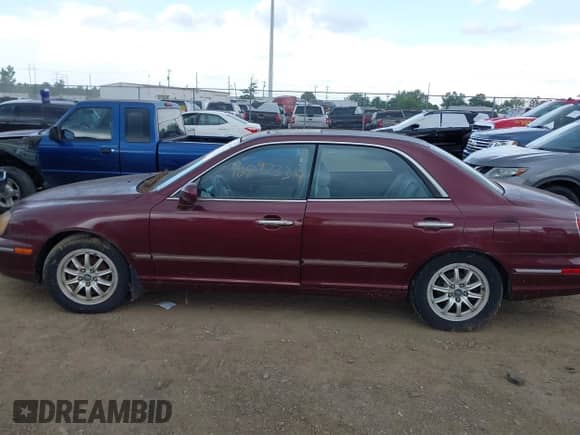 2003 Hyundai XG with VIN KMHFU45E33A252846, listed as a IAAI auction lot 42897334 with 94,636 mi miles and . Bid and sale history available at DreamBid. Image 14.