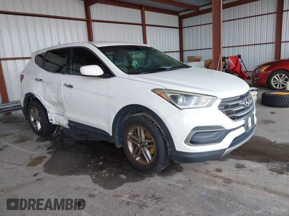 2018 Hyundai Santa Fe 2.4L z VIN 5XYZT3LB5JG516329, wystawiony jako IAAI lot #43392532 z przebiegiem 94 128 mil mil oraz . Historia ofert i sprzedaży dostępna na DreamBid. Obrazek 1.
