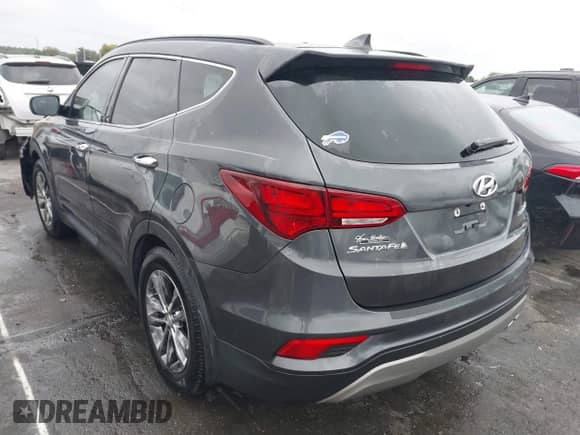 2018 Hyundai Santa Fe 2.0T with VIN 5XYZU4LA1JG529573, listed as a IAAI auction lot 43307903 with 83,585 mi miles and . Bid and sale history available at DreamBid. Image 3.