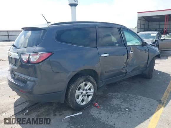 2014 Chevrolet Traverse LS z VIN 1GNKVFED8EJ309426, wystawiony jako IAAI lot #42571126 z przebiegiem 225 400 mil mil oraz . Historia ofert i sprzedaży dostępna na DreamBid. Obrazek 4.