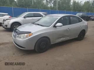 2010 Hyundai Elantra GL z VIN KMHDU4BD9AU987975, wystawiony jako Copart lot #66530275 z przebiegiem 193 920 mil mil oraz Czysty tytuł • Clean title. Historia ofert i sprzedaży dostępna na DreamBid. Obrazek 1.