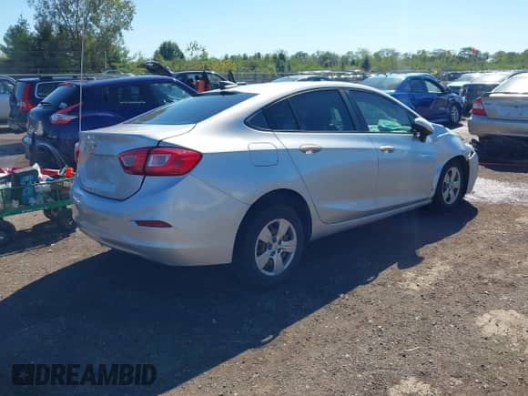 2018 Chevrolet Cruze LS with VIN 1G1BC5SM0J7166114, listed as a IAAI auction lot 43395438 with 70,247 mi miles and . Bid and sale history available at DreamBid. Image 4.