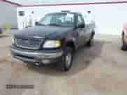 2000 Ford F-150 XL with VIN 1FTRF18L2YNA83696, listed as a IAAI auction lot 42047463 with Not provided miles and . Bid and sale history available at DreamBid. Image 2.