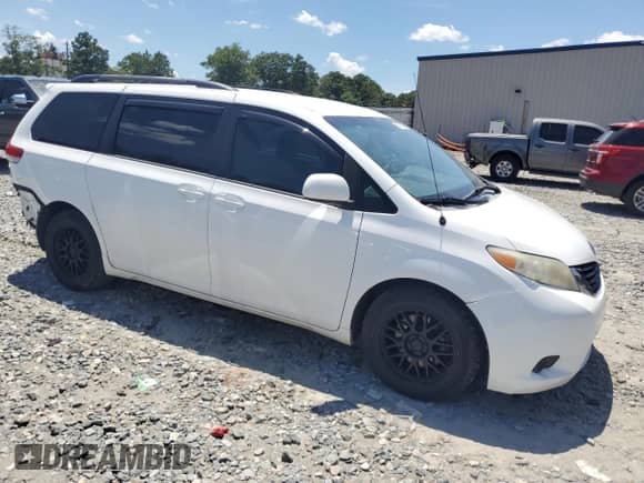 2012 Toyota Sienna LE with VIN 5TDJK3DC2CS044393, listed as a Copart auction lot 63579595 with 152,636 mi miles and Salvage title. Bid and sale history available at DreamBid. Image 4.