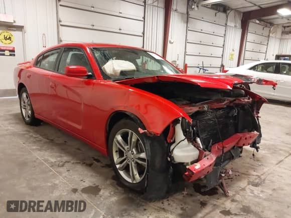 2013 Dodge Charger SXT with VIN 2C3CDXJG6DH528802, listed as a IAAI auction lot 42172409 with 77,107 mi miles and . Bid and sale history available at DreamBid. Image 1.