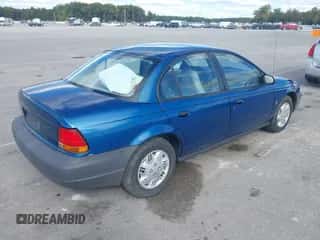 1999 Saturn SL z VIN 1G8ZH5285XZ366231, wystawiony jako IAAI lot #43435350 z przebiegiem 200 293 mil mil oraz . Historia ofert i sprzedaży dostępna na DreamBid. Obrazek 4.