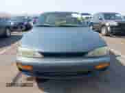 1996 Toyota Camry LE z VIN JT2BF12K0T0176314, wystawiony jako IAAI lot #42730853 z przebiegiem 197 978 mil mil oraz . Historia ofert i sprzedaży dostępna na DreamBid. Obrazek 12.