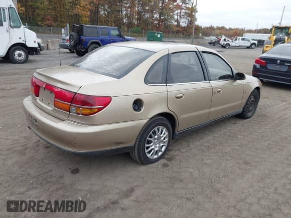 2001 Saturn LS z VIN 1G8JU54F31Y554702, wystawiony jako IAAI lot #43423433 z przebiegiem Nie podano mil oraz . Historia ofert i sprzedaży dostępna na DreamBid. Obrazek 4.