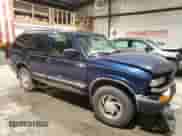 1999 Chevrolet Blazer LS with VIN 1GNDT13WXX2190801, listed as a Copart auction lot 45311155 with 212,709 mi miles and Salvage title. Bid and sale history available at DreamBid. Image 4.