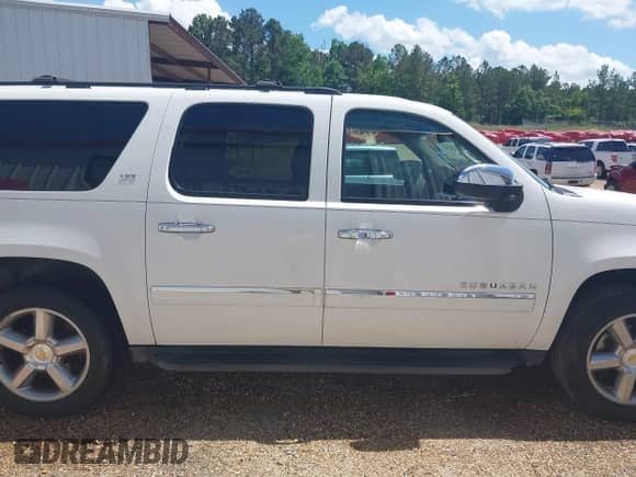 2011 Chevrolet Suburban LTZ with VIN 1GNSKKE37BR348112, listed as a IAAI auction lot 42267962 with 163,558 mi miles and . Bid and sale history available at DreamBid. Image 13.