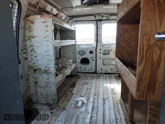 2001 Ford Econoline Cargo z VIN 1FTNE24241HB20207, wystawiony jako Copart lot #43284425 z przebiegiem 157 949 mil mil oraz Czysty tytuł • Clean title. Historia ofert i sprzedaży dostępna na DreamBid. Obrazek 11.