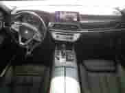 2017 BMW 7 Series 740i with VIN WBA7E2C57HG740275, listed as a Copart auction lot 68719665 with 114,599 mi miles and Salvage title. Bid and sale history available at DreamBid. Image 8.