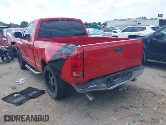 2003 Dodge 1500 ST z VIN 1D7HA16N43J580530, wystawiony jako IAAI lot #42401262 z przebiegiem 175 197 mil mil oraz . Historia ofert i sprzedaży dostępna na DreamBid. Obrazek 3.