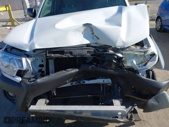 2012 Toyota Tacoma with VIN 5TFJX4CN4CX015403, listed as a IAAI auction lot 42266925 with 149,718 mi miles and . Bid and sale history available at DreamBid. Image 6.