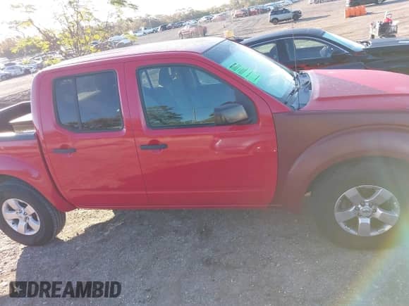 2009 Nissan Frontier SE with VIN 1N6AD07U19C419811, listed as a IAAI auction lot 41090904 with 141,119 mi miles and . Bid and sale history available at DreamBid. Image 13.