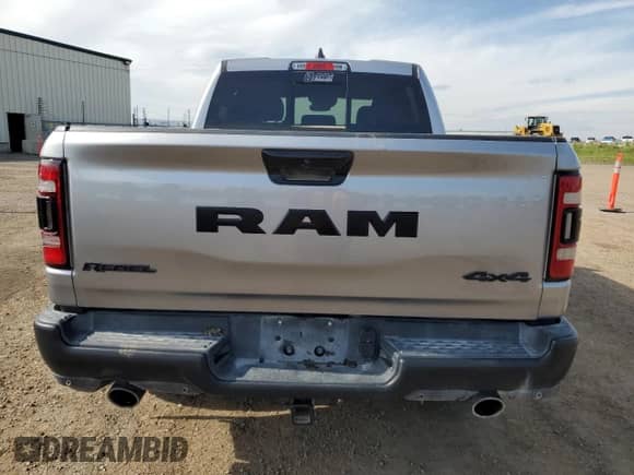 2024 Ram 1500 Rebel z VIN 1C6SRFLT2RN211523, wystawiony jako Copart lot #68870655 z przebiegiem 24 028 mil mil oraz Szkoda całkowita • Salvage title. Historia ofert i sprzedaży dostępna na DreamBid. Obrazek 6.