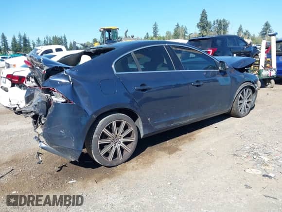 2015 Volvo S60 T5 Drive-E Premier with VIN YV126MFB5F1299795, listed as a IAAI auction lot 43052703 with 100,066 mi miles and . Bid and sale history available at DreamBid. Image 4.