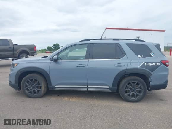 2023 Honda Pilot Elite с VIN 5FNYG1H82PB034130, выставлен на аукционе IAAI как лот 42791889 с пробегом 7 711 миль миль и . История ставок и продаж доступна на DreamBid. Изображение 14.