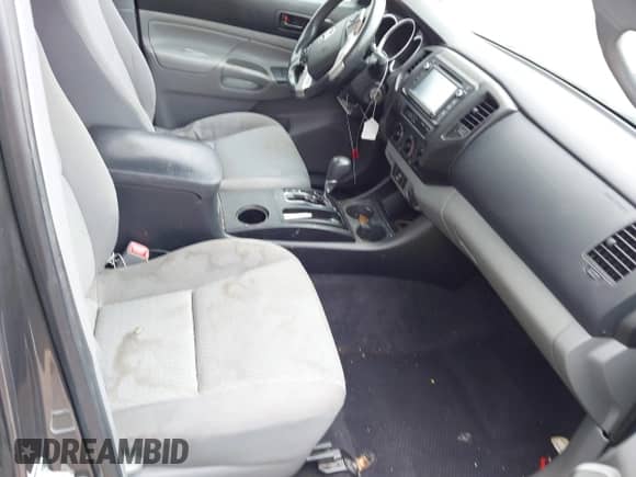 2014 Toyota Tacoma PreRunner z VIN 5TFJX4GN0EX027383, wystawiony jako IAAI lot #42299753 z przebiegiem 194 136 mil mil oraz . Historia ofert i sprzedaży dostępna na DreamBid. Obrazek 5.