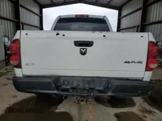 2007 Dodge 1500 ST z VIN 1D7HU18PX7J592967, wystawiony jako Copart lot #60609964 z przebiegiem 127 395 mil mil oraz Czysty tytuł • Clean title. Historia ofert i sprzedaży dostępna na DreamBid. Obrazek 6.