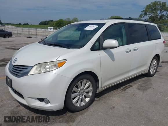 2011 Toyota Sienna XLE AAS with VIN 5TDYK3DC1BS077317, listed as a IAAI auction lot 42972865 with 314,983 mi miles and . Bid and sale history available at DreamBid. Image 2.