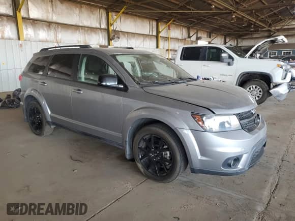 2018 Dodge Journey SXT z VIN 3C4PDCBB8JT172199, wystawiony jako Copart lot #68709775 z przebiegiem 103 331 mil mil oraz Szkoda całkowita • Salvage title. Historia ofert i sprzedaży dostępna na DreamBid. Obrazek 4.
