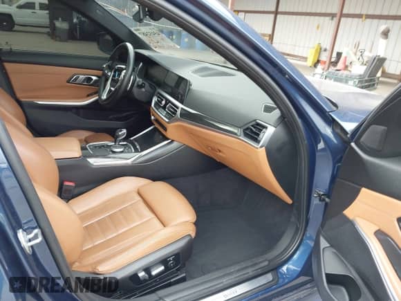 2021 BMW 3 Series 330i с VIN 3MW5R1J09M8B86677, выставлен на аукционе IAAI как лот 43432487 с пробегом 74 515 миль миль и . История ставок и продаж доступна на DreamBid. Изображение 5.