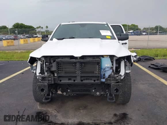 2023 Ram 1500 Tradesman z VIN 1C6RRFCG0PN671343, wystawiony jako IAAI lot #43198482 z przebiegiem 85 585 mil mil oraz . Historia ofert i sprzedaży dostępna na DreamBid. Obrazek 6.