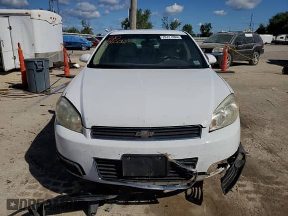 2011 Chevrolet Impala LTZ z VIN 2G1WC5EM1B1190028, wystawiony jako Copart lot #70317565 z przebiegiem Nie podano mil oraz Szkoda całkowita • Salvage title. Historia ofert i sprzedaży dostępna na DreamBid. Obrazek 5.