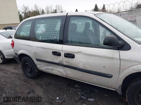 2006 Dodge Caravan Cargo with VIN 1D4GP21E66B515326, listed as a IAAI auction lot 41611035 with 61,398 mi miles and . Bid and sale history available at DreamBid. Image 6.