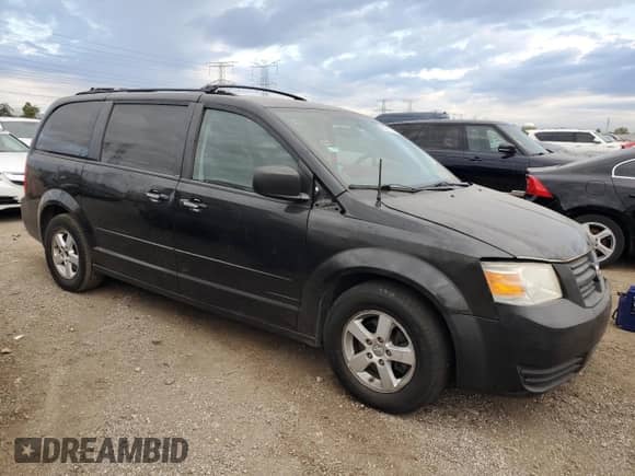 2010 Dodge Grand Caravan Hero z VIN 2D4RN3D14AR440343, wystawiony jako Copart lot #82374115 z przebiegiem 157 554 mil mil oraz Szkoda całkowita • Salvage title. Historia ofert i sprzedaży dostępna na DreamBid. Obrazek 4.