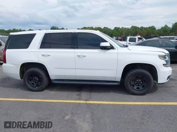 2018 Chevrolet Tahoe Commercial z VIN 1GNLCDEC4JR223676, wystawiony jako IAAI lot #43327555 z przebiegiem 208 566 mil mil oraz . Historia ofert i sprzedaży dostępna na DreamBid. Obrazek 13.