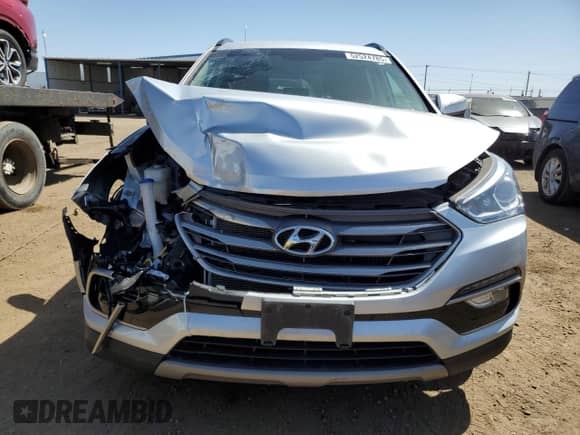 2018 Hyundai Santa Fe 2.0T с VIN 5XYZUDLA3JG537318, выставлен на аукционе Copart как лот 52524785 с пробегом 70 081 миль миль и Списание • Salvage title. История ставок и продаж доступна на DreamBid. Изображение 5.