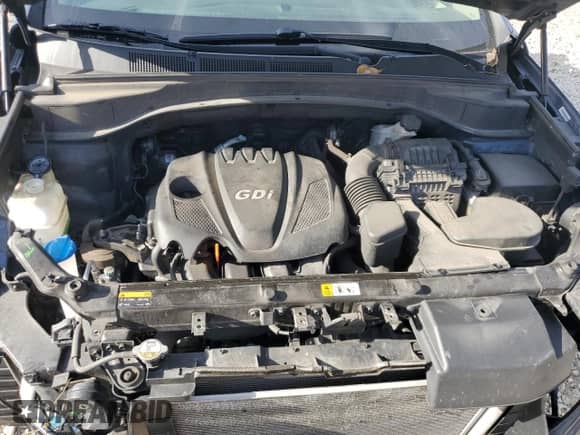 2014 Hyundai Santa Fe z VIN 5XYZUDLB7EG177484, wystawiony jako Copart lot #82601495 z przebiegiem 101 832 mil mil oraz Szkoda całkowita • Salvage title. Historia ofert i sprzedaży dostępna na DreamBid. Obrazek 11.