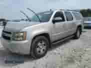 2007 Chevrolet Suburban LT z VIN 3GNFC16027G135928, wystawiony jako Copart lot #66864605 z przebiegiem 289 418 mil mil oraz Szkoda całkowita • Salvage title. Historia ofert i sprzedaży dostępna na DreamBid. Obrazek 1.
