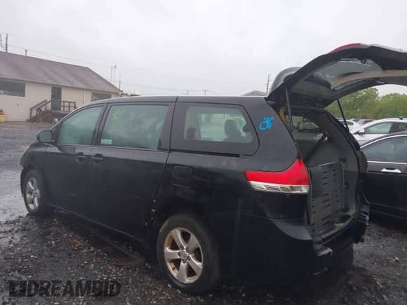 2014 Toyota Sienna L with VIN 5TDZK3DC1ES452065, listed as a IAAI auction lot 42328789 with Not provided miles and . Bid and sale history available at DreamBid. Image 13.