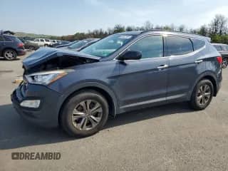 2015 Hyundai Santa Fe with VIN 5XYZUDLB0FG279064, listed as a Copart auction lot 63467345 with 69,935 mi miles and Salvage title. Bid and sale history available at DreamBid. Image 1.