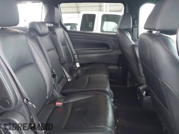 2023 Honda Odyssey Sport z VIN 5FNRL6H75PB074822, wystawiony jako IAAI lot #42040120 z przebiegiem 158 657 mil mil oraz . Historia ofert i sprzedaży dostępna na DreamBid. Obrazek 8.