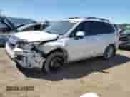 2014 Subaru Forester Premium with VIN JF2SJACC7EG459947, listed as a Copart auction lot 64106135 with 151,033 mi miles and Salvage title. Bid and sale history available at DreamBid. Image 1.