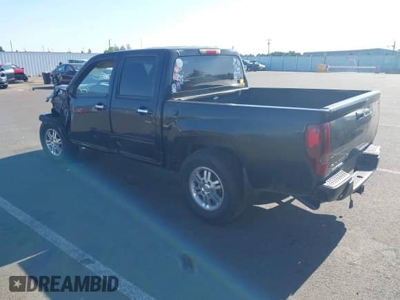 2011 Chevrolet Colorado 1LT z VIN 1GCHTCFE2B8115945, wystawiony jako IAAI lot #42314389 z przebiegiem 250 571 mil mil oraz . Historia ofert i sprzedaży dostępna na DreamBid. Obrazek 3.