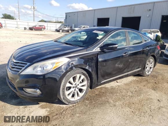 2014 Hyundai Azera Limited с VIN KMHFH4JG0EA385935, выставлен на аукционе Copart как лот 86805355 с пробегом 86 145 миль миль и Списание • Salvage title. История ставок и продаж доступна на DreamBid. Изображение 1.