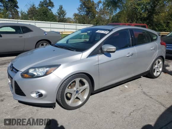 2014 Ford Focus Titanium with VIN 1FADP3N22EL209180, listed as a Copart auction lot 82577545 with 71,107 mi miles and Clean title. Bid and sale history available at DreamBid. Image 1.