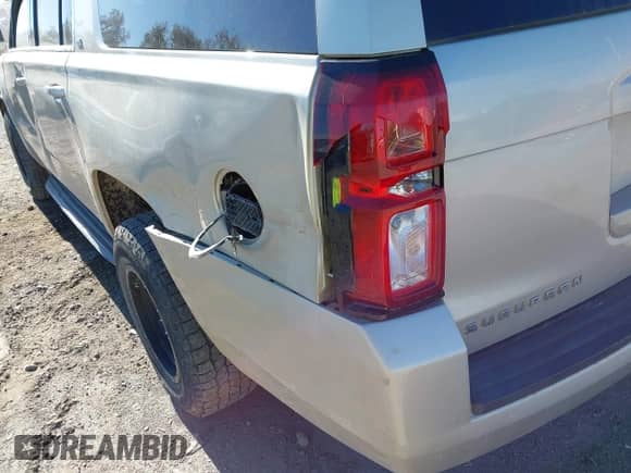 2015 Chevrolet Suburban with VIN 1GNSK5EC1FR682675, listed as a IAAI auction lot 43283608 with 203,132 mi miles and . Bid and sale history available at DreamBid. Image 19.