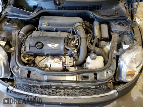 2012 MINI Hardtop S with VIN WMWSV3C51CTY16623, listed as a Copart auction lot 67827615 with 83,852 mi miles and Salvage title. Bid and sale history available at DreamBid. Image 11.