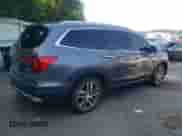 2016 Honda Pilot Touring z VIN 5FNYF6H94GB116143, wystawiony jako Copart lot #67596925 z przebiegiem 94 635 mil mil oraz Szkoda całkowita • Salvage title. Historia ofert i sprzedaży dostępna na DreamBid. Obrazek 3.